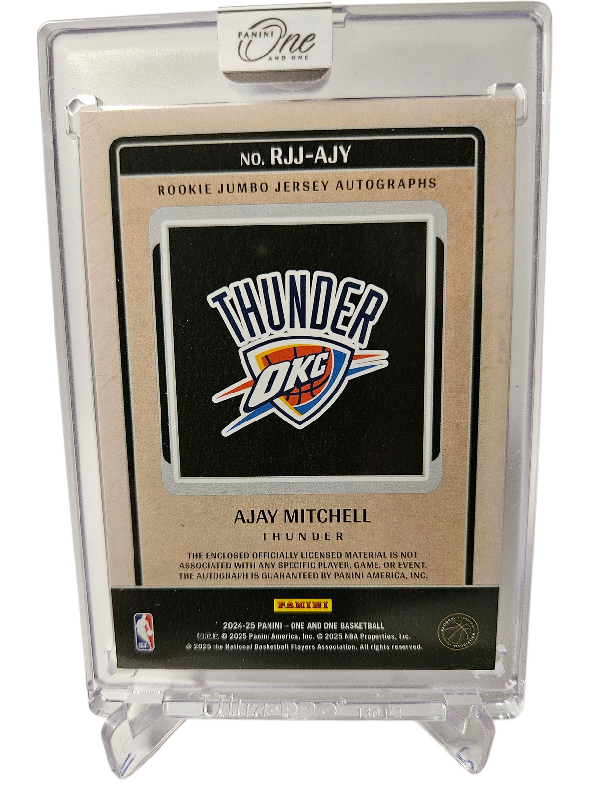 2024-25 Panini One And One #RJJ-AJY Ajay Mitchell Rookie Jumbo Jersey On Card Autograph Red 22/25