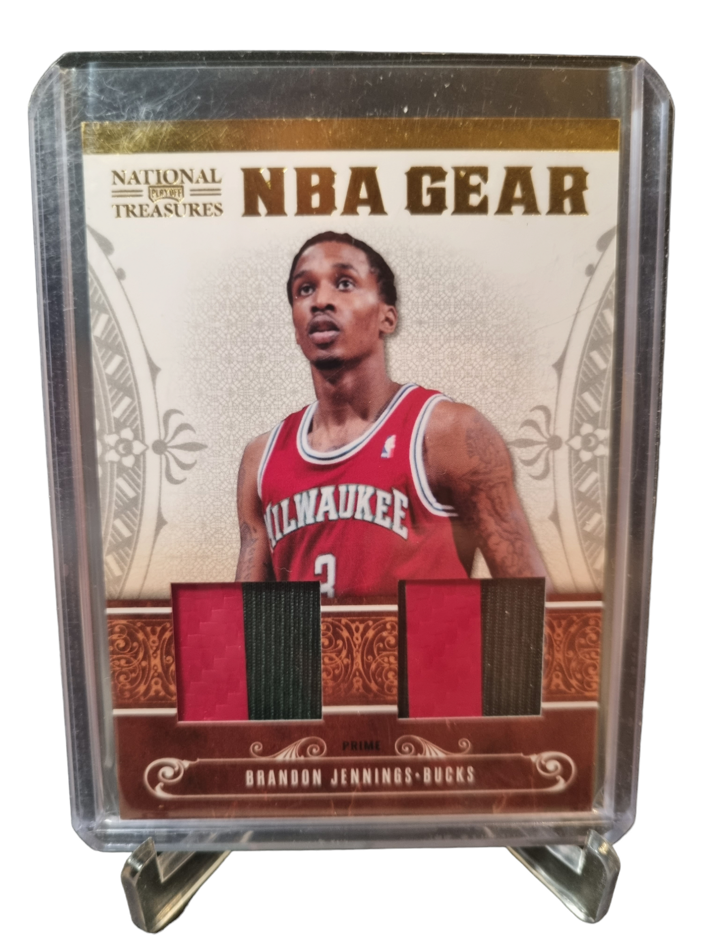 2011 Panini National Treasures #15 Brandon Jennings Game Worn Duel Patch 08/10