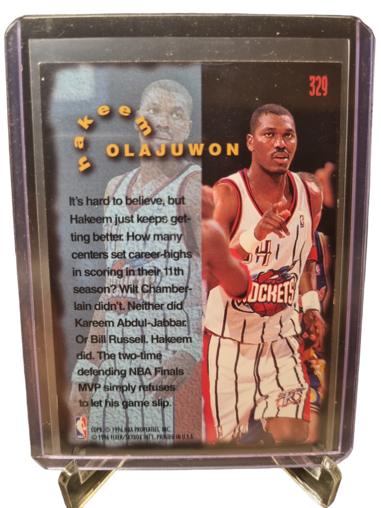 1995-96 Fleer #329 Hakeem Olajuwon Firm Foundation