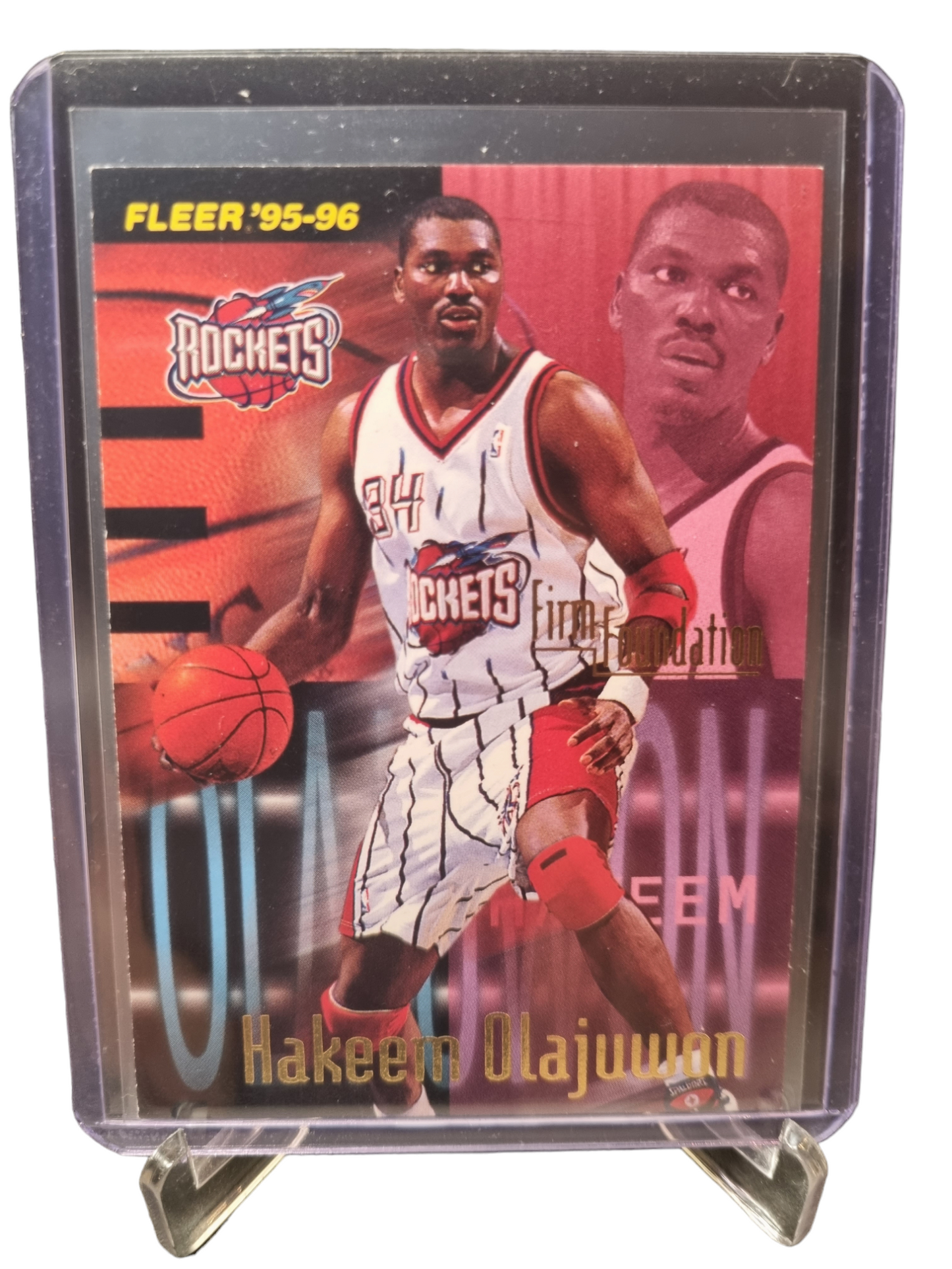 1995-96 Fleer #329 Hakeem Olajuwon Firm Foundation