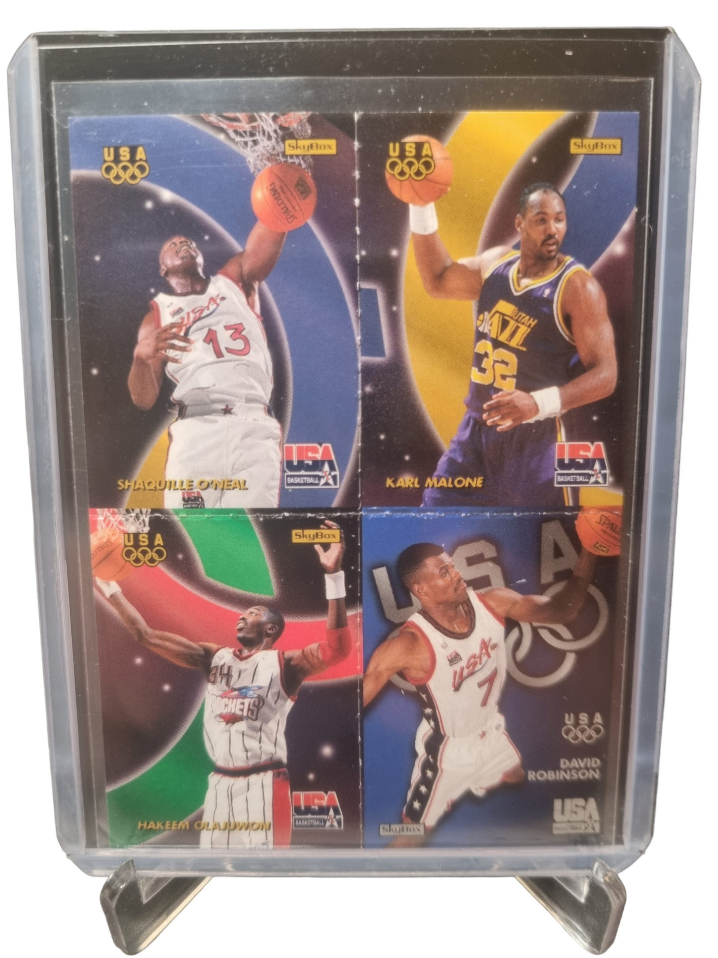 1996 Skybox #Q11 Shaquille O'Neal/Karl Malone/Hakeem Olajuwon/David Robinson Quads