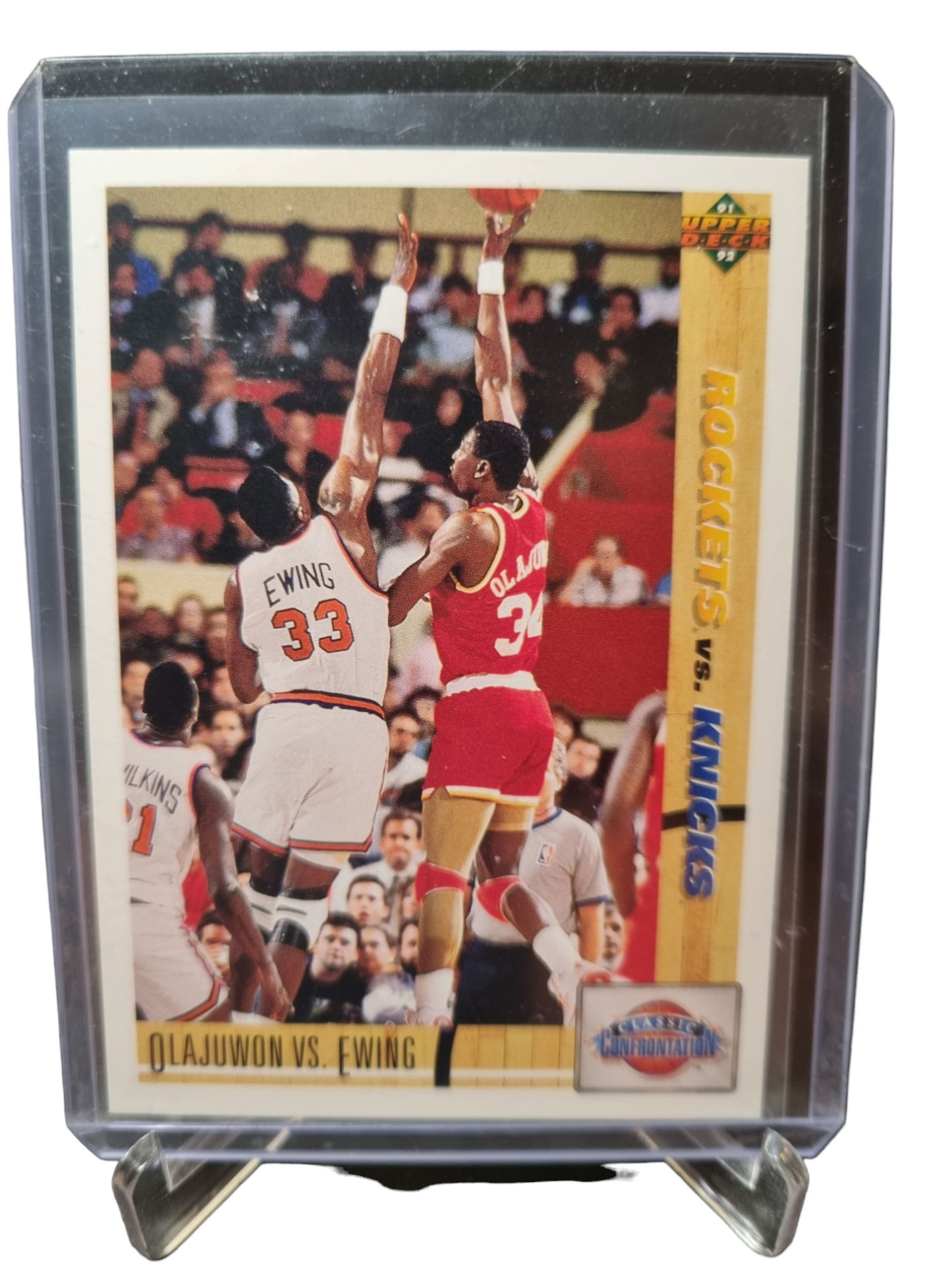 1991 Upper Deck #33 Hakeem Olajuwon/Patrick Ewing Classic Confrontation