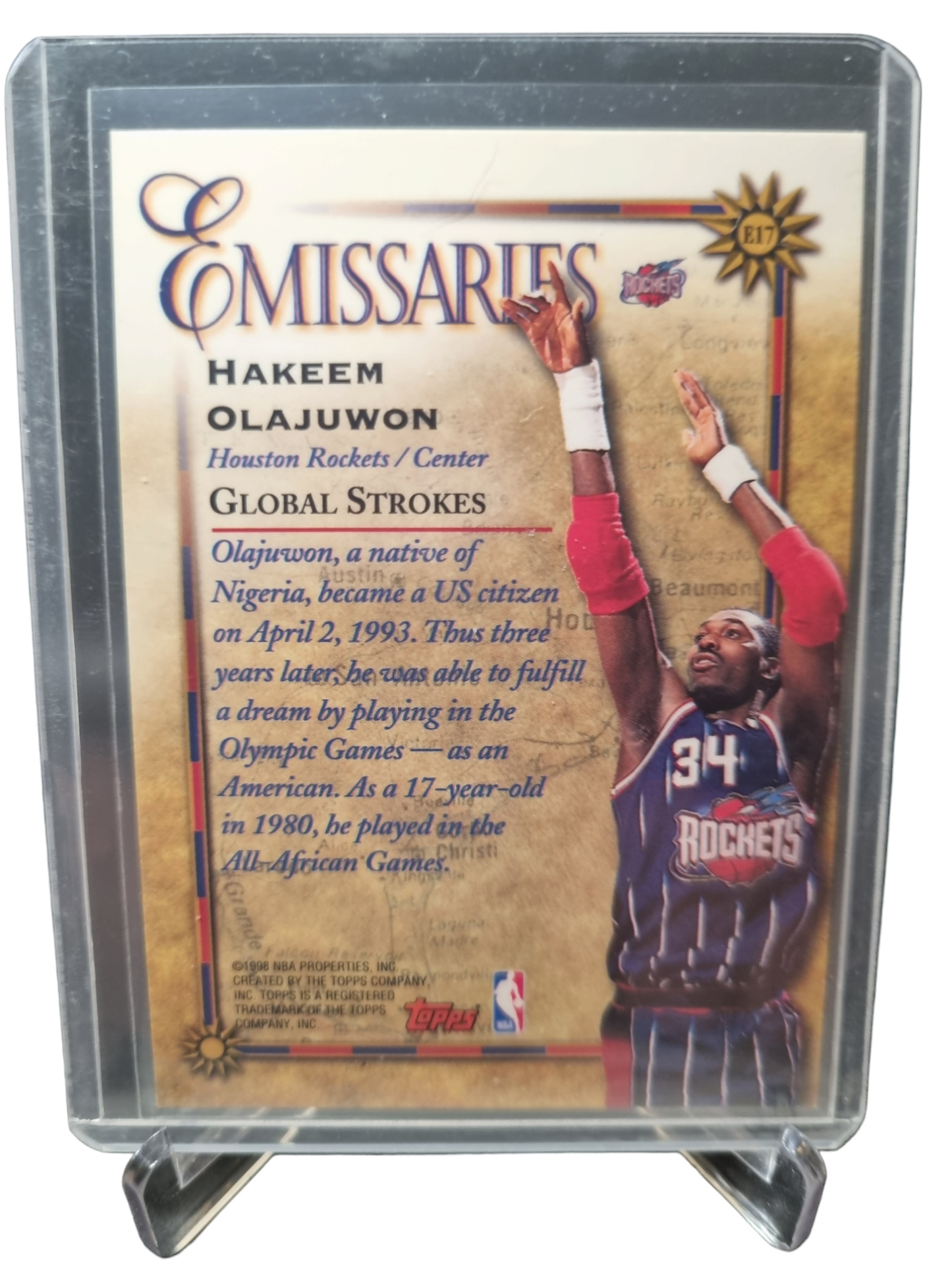 1998 Topps #E17 Hakeem Olajuwon Emissaries