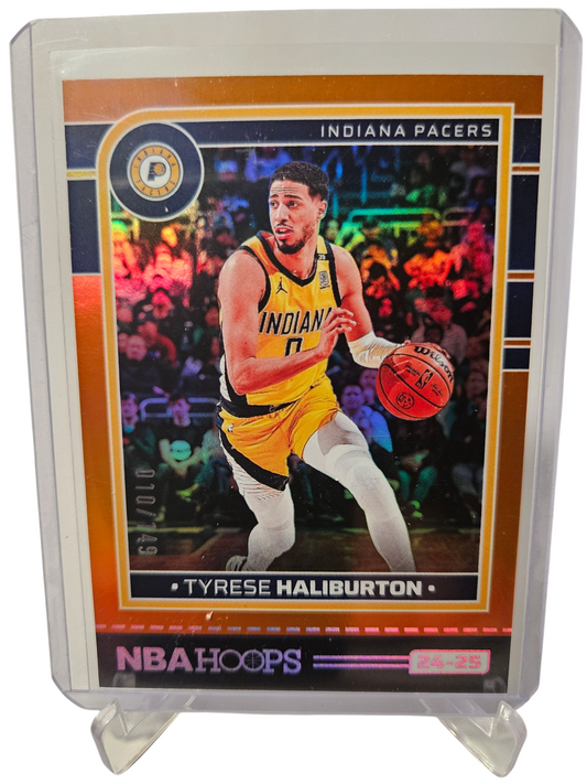 2024-25 Panini Hoops #104 Tyrese Haliburton Orange Holo 010/149